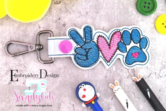 In the Hoop Peace Love Paw Keychain: A Designer Review